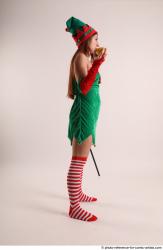 Veronika Elf Pose With Apple